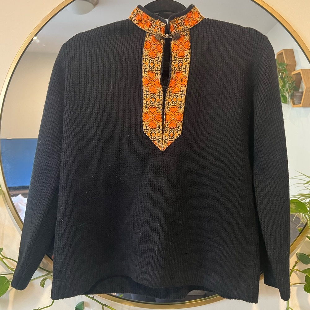 Vintage women’s black sweater with metal closure